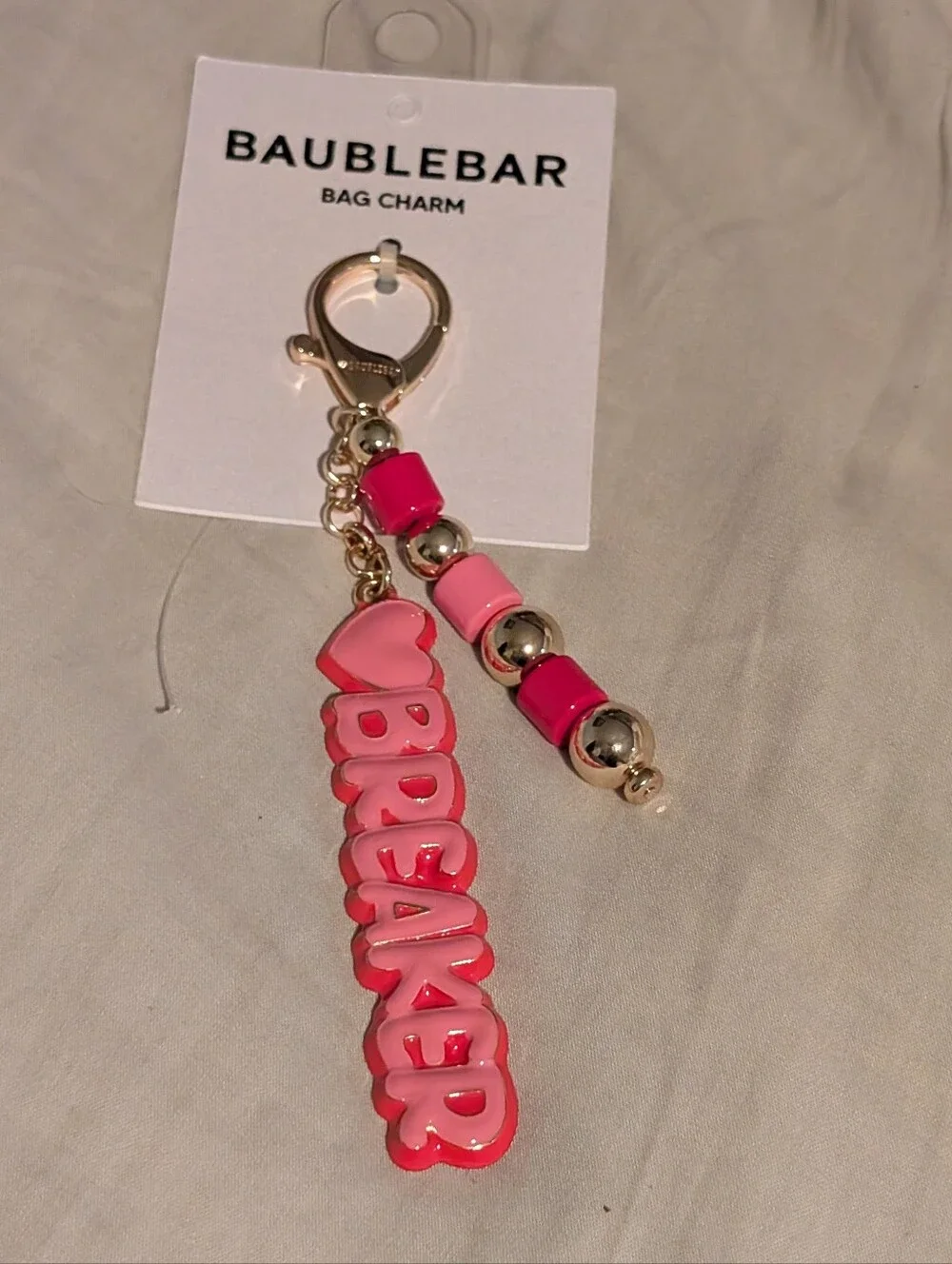 BaubleBar Pink Logo Bag Charm Keychain
